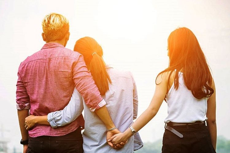 Image Of A Man And A Woman Holding Hands